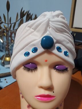 White Embellished Headwrap with Blue Gem Accents.